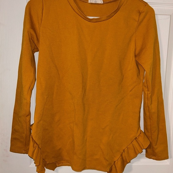 betseys boutique shop Tops - Betseys Boutique Shop Golden Ruffle Hem Long Sleeve Blouse